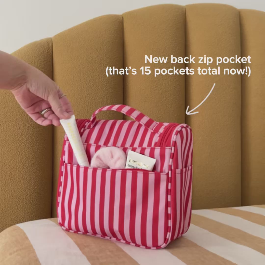 Load video: Bon Voyage Travel Toiletry Bag -- Pink and Red Stripe